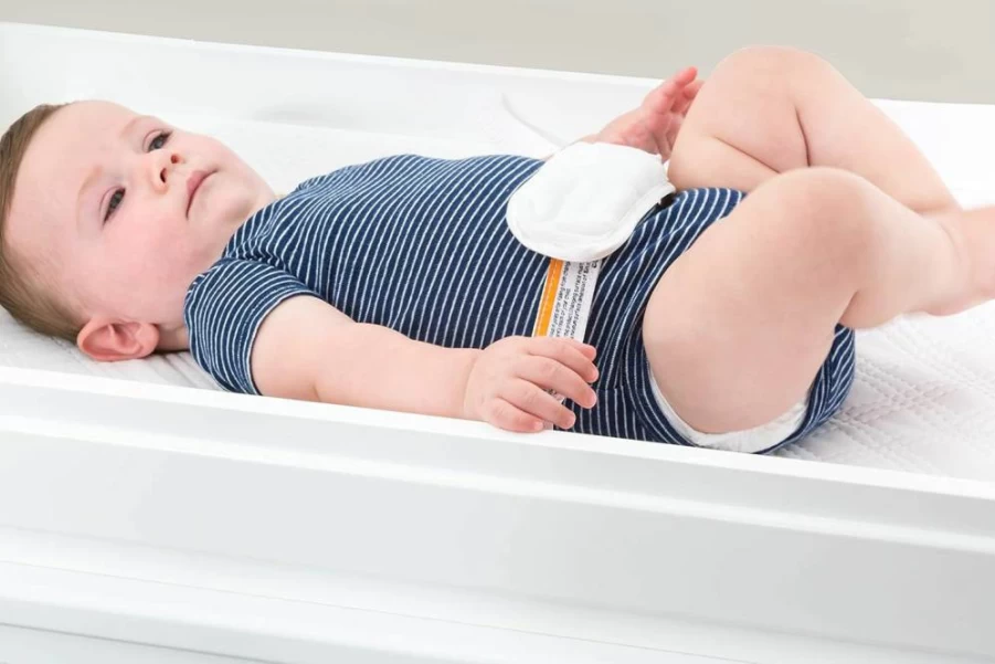 Graco Premium Water-Resistant Baby Changing Pad - GREENGUARD Gold Certified, Ultra-Soft Buckle Cover, Non-Skid Bottom, Fits Standard Changing Tables